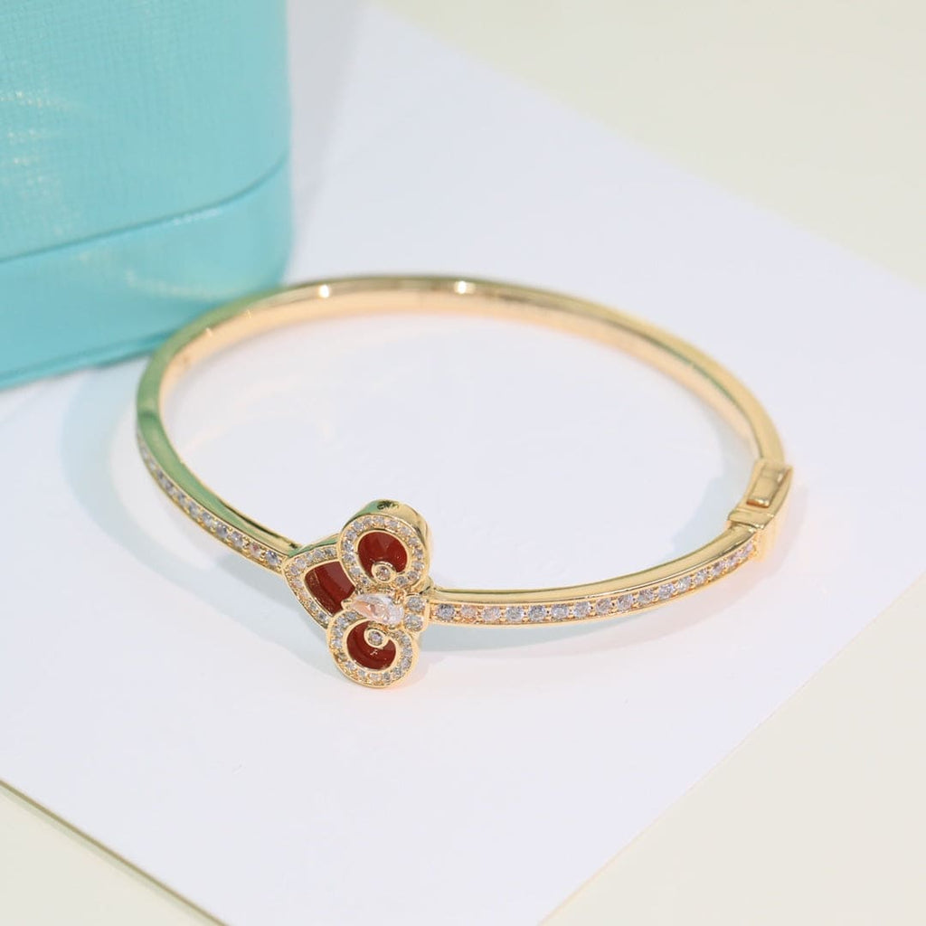 Tiffany Fleur De Lis Bracelet - 18K Yellow Gold