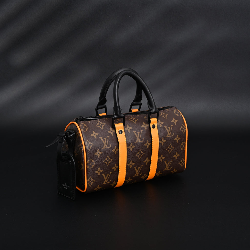 Louis Vuitton Keepall Bandoulière 50 – Monogram Canvas with Neon Orange Trim Travel Bag
