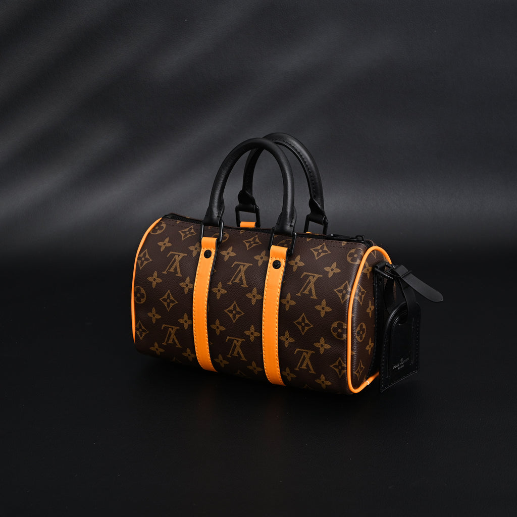 Louis Vuitton Keepall Bandoulière 50 – Monogram Canvas with Neon Orange Trim Travel Bag