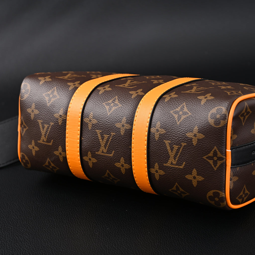 Louis Vuitton Keepall Bandoulière 50 – Monogram Canvas with Neon Orange Trim Travel Bag