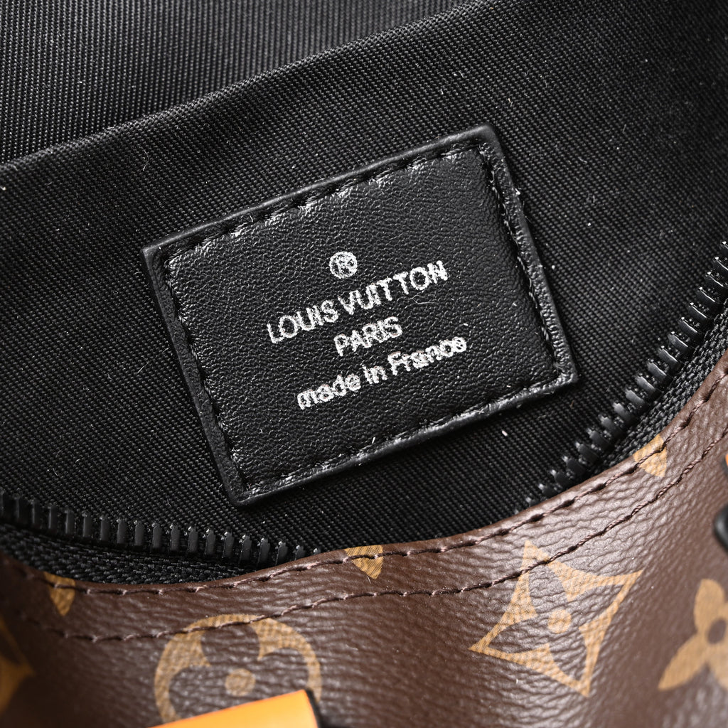 Louis Vuitton Keepall Bandoulière 50 – Monogram Canvas with Neon Orange Trim Travel Bag