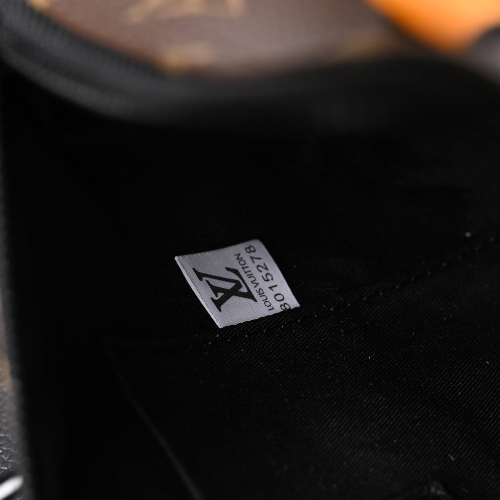 Louis Vuitton Keepall Bandoulière 50 – Monogram Canvas with Neon Orange Trim Travel Bag