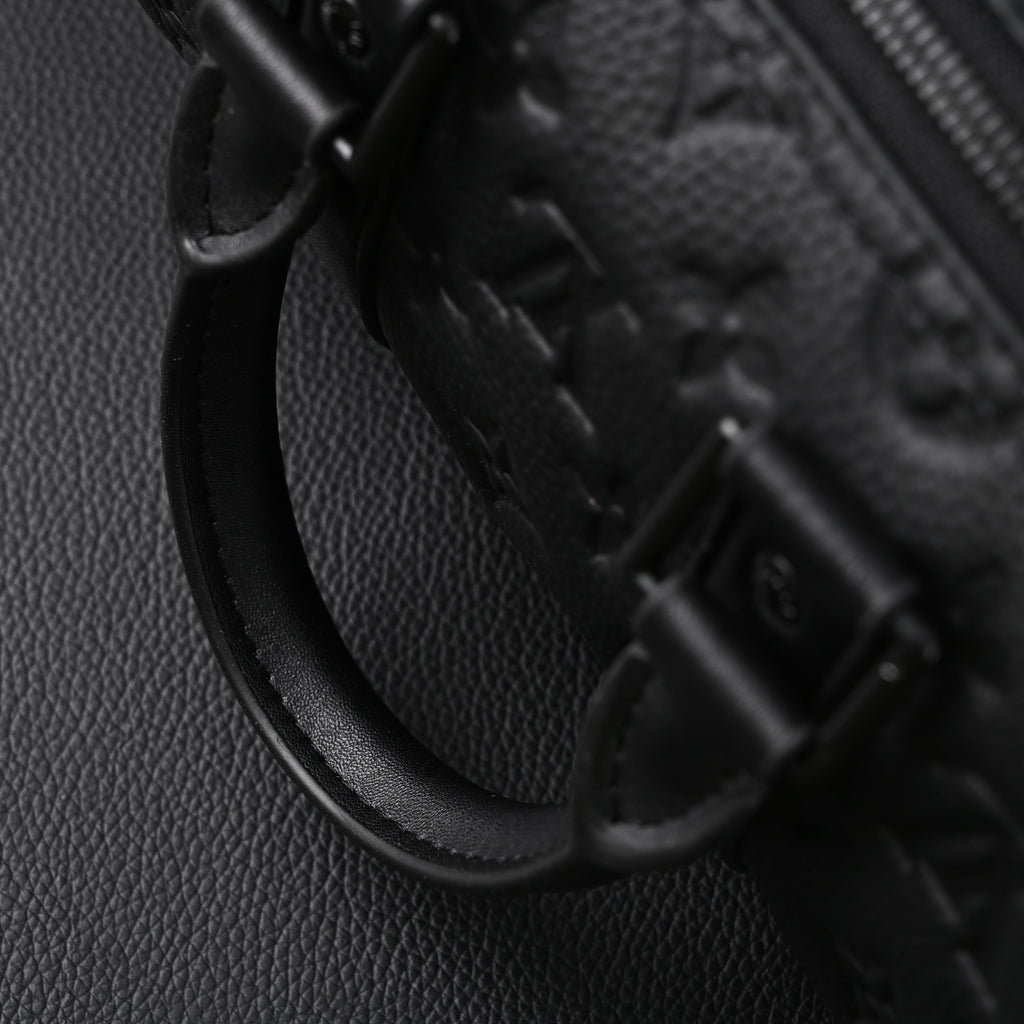 Louis Vuitton Keepall Bandoulière 50 – Monogram Shadow Black Leather Travel Bag