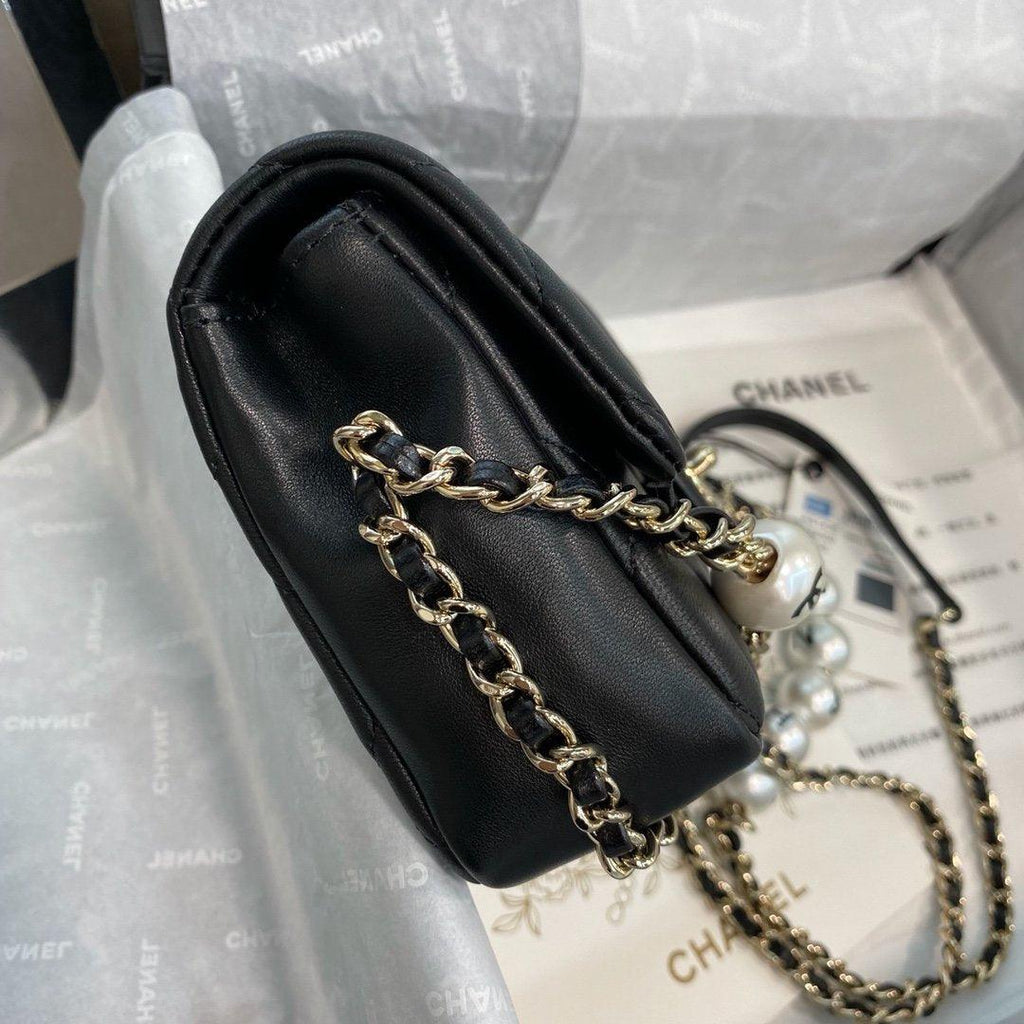 Chanel Pearl Logo Strap Flap Bag Black