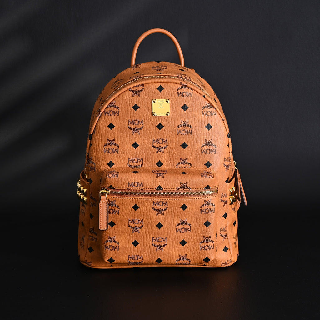Mcm Stark Visetos Medium Backpack – Cognac Monogram with Gold-Tone Studs - Cognac with Black Monogram Print