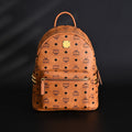Mcm Stark Visetos Medium Backpack – Cognac Monogram with Gold-Tone Studs - Cognac with Black Monogram Print