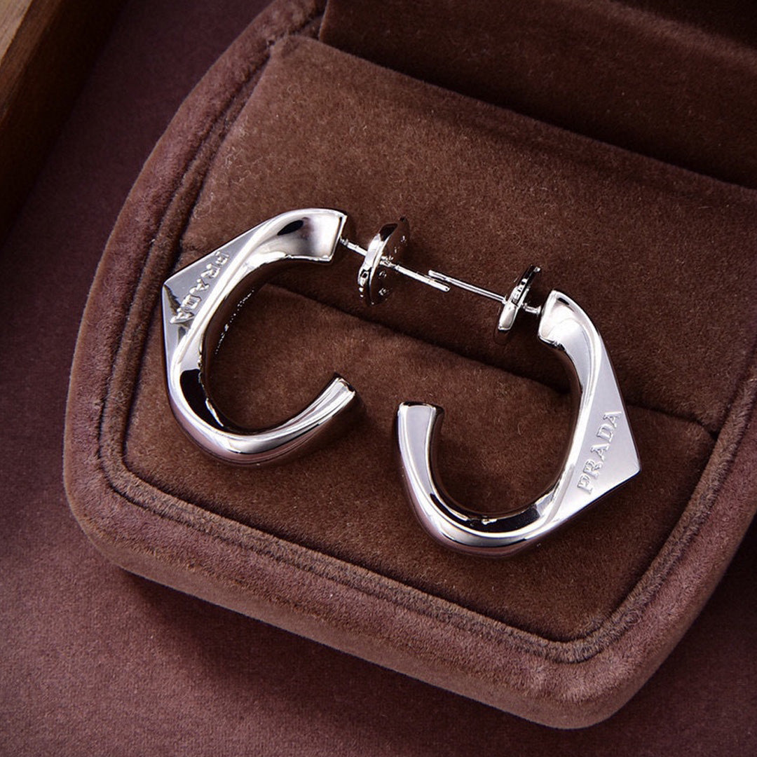 Prada Triangle Open Earrings - 18K Gold