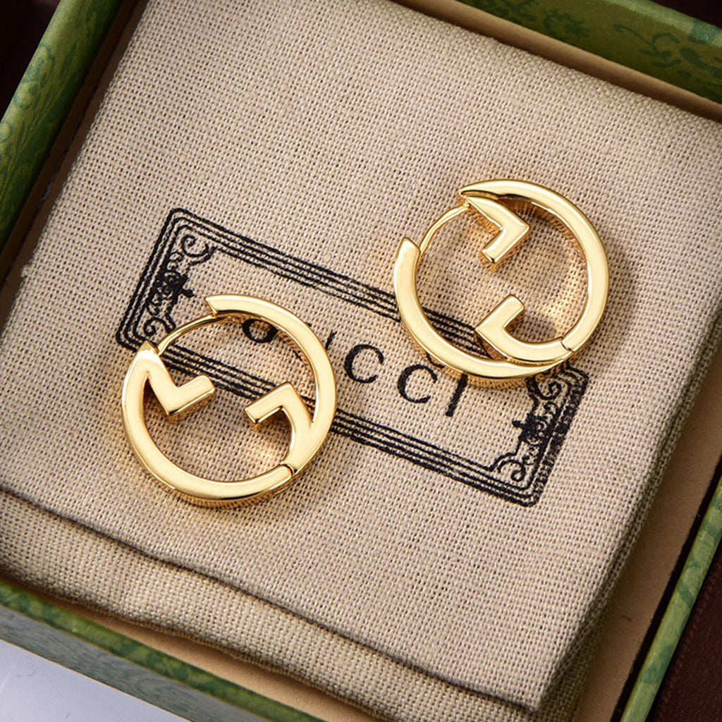 Gucci Double G Hollow Earrings - 18K Yellow Gold
