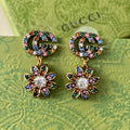 Gucci Double G Flower Pendant Earrings - 18K Yellow Gold