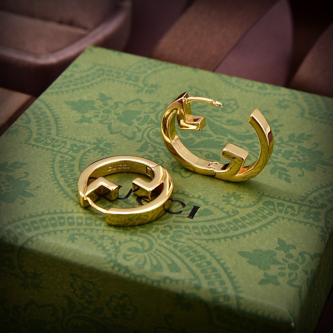 Gucci Double G Hollow Earrings - 18K Yellow Gold