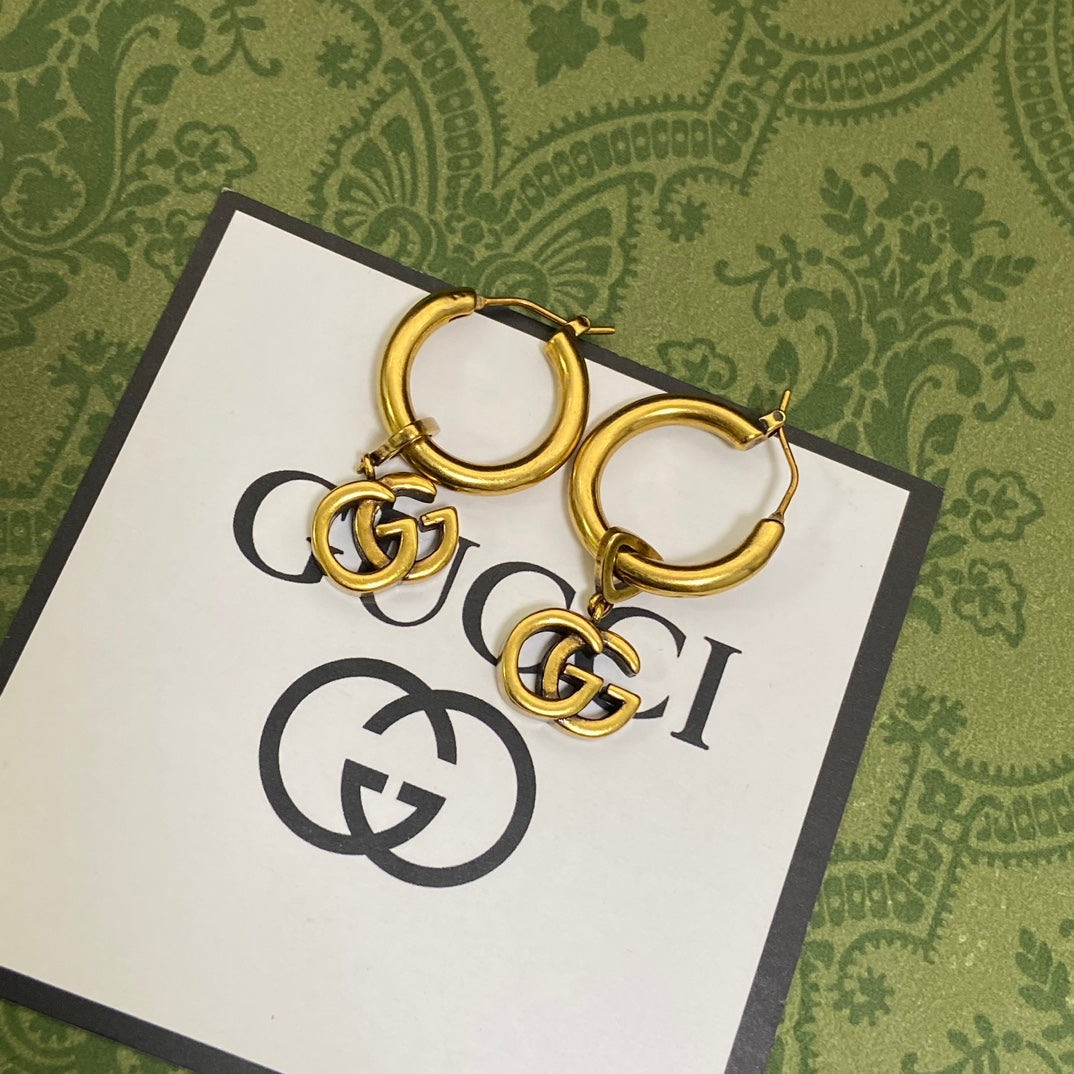 Gucci Double G Hollow Earrings - 18K Yellow Gold