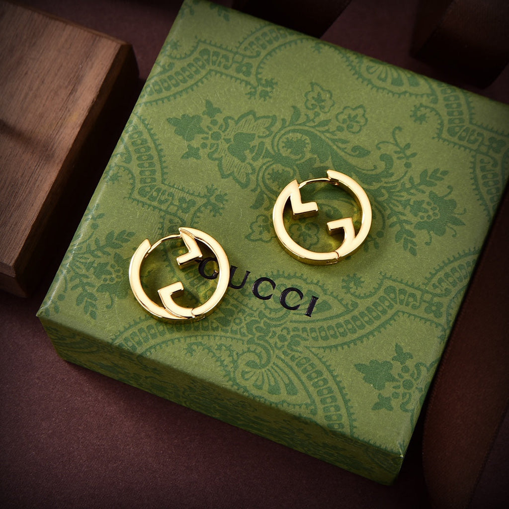 Gucci Double G Hollow Earrings - 18K Yellow Gold